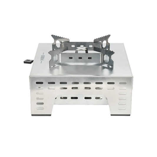 Side profile of the ES320 stainless steel ethanol stove, highlighting the precision-engineered ventilation slots on the stove body for optimized airflow and combustion efficiency.