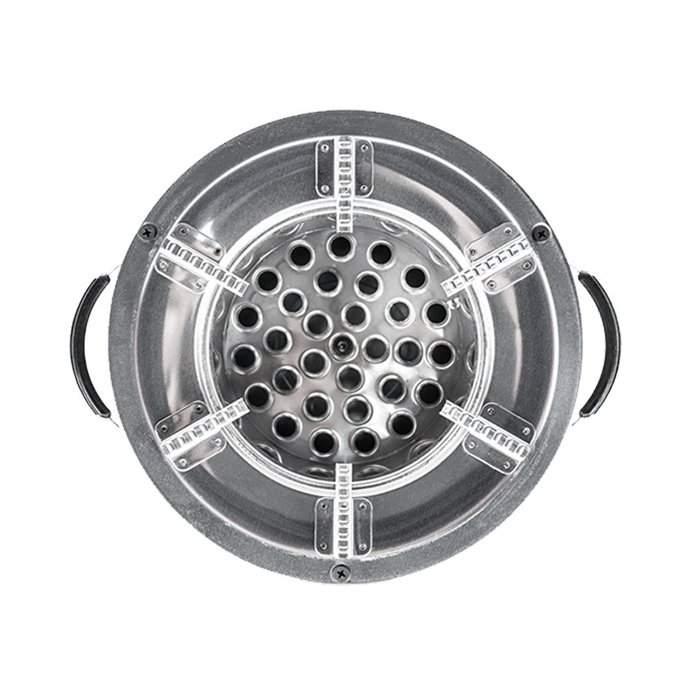 Top-down view of the C26-10B stainless steel charcoal stove combustion chamber, showcasing the secondary air vent pattern and integrated cooktop grates.