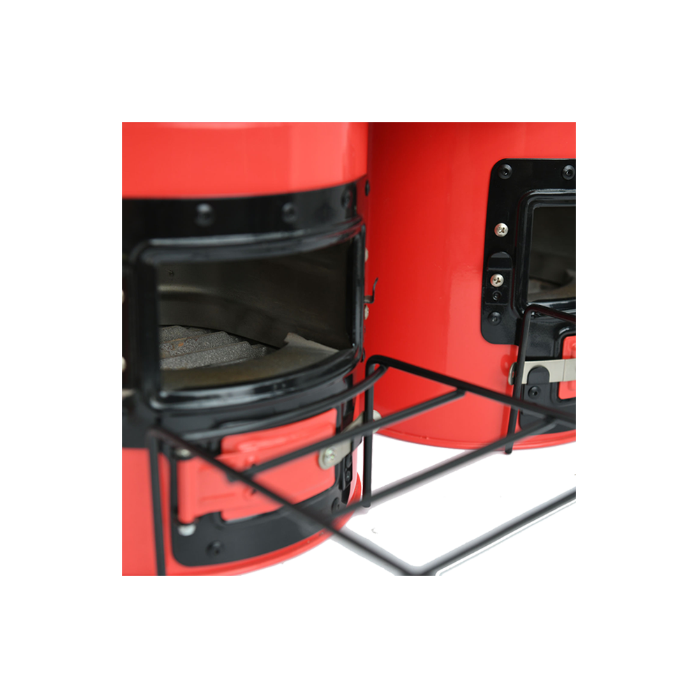 Close-up of the M45 stove's firebox doors and loading area, showcasing its insulated design that stays cool to the touch.