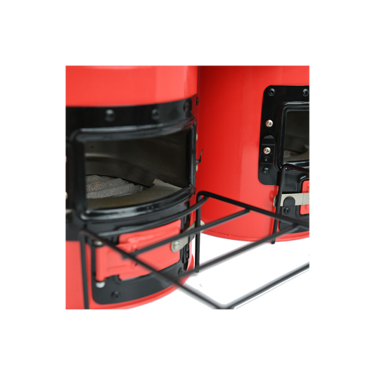 Close-up of the M45 stove's firebox doors and loading area, showcasing its insulated design that stays cool to the touch.